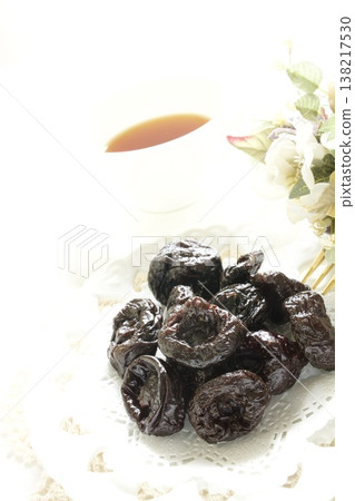 Dried prunes and black tea Dried prunes and black tea 138217530