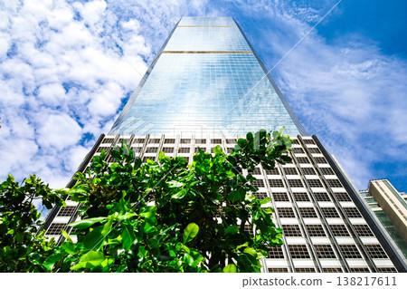 Landscape of the office town looking up at a skyscraper Landscape of the office town looking up at a skyscraper 138217611
