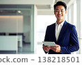 A man with a tablet and a smile 138218501