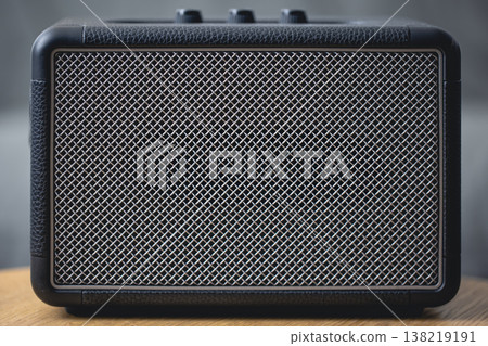 Square music speaker, metallic mesh texture close-up. Square music speaker, metallic mesh texture close-up. 138219191