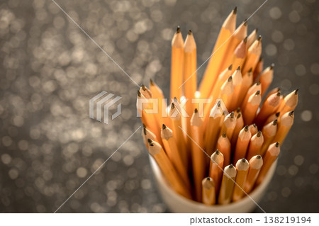 the stack of pencils in a glass 138219194