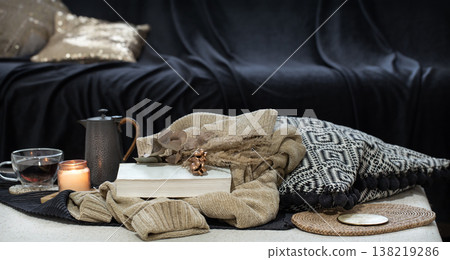 Still life with home decor details in the foreground on dark background Still life with home decor details in the foreground on dark background 138219286