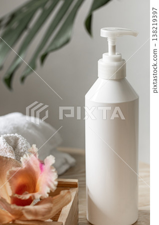 Treatment bottle with dispenser and Thai Orzidea. 138219397