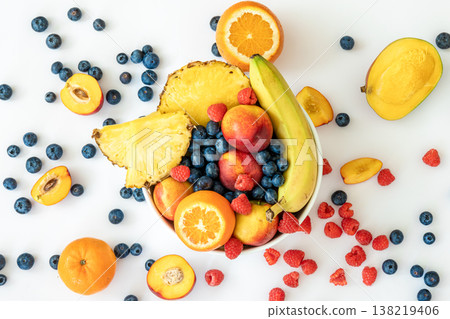 Tropical fruits on a white background top view. Tropical fruits on a white background top view. 138219406