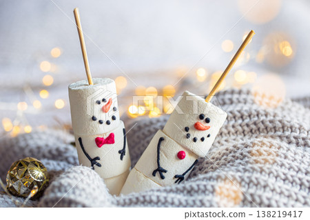 Two happy funny marshmallow snowmen, Christmas winter holiday decoration. 138219417