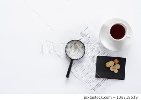 Visa application form, documents and a cup of coffee on a white background. Visa application form, documents and a cup of coffee on a white background. 138219639