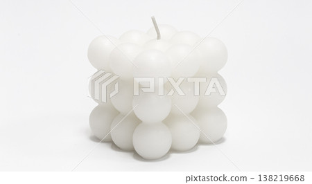 White candle square shape on a white background isolated. White candle square shape on a white background isolated. 138219668