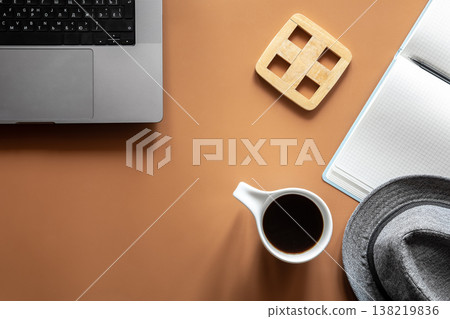Workplace, flat lay minimalist composition with laptop and coffee cup. Workplace, flat lay minimalist composition with laptop and coffee cup. 138219836