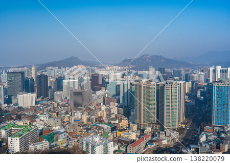 Seoul, South Korea : Feb. 18, 2026 : High angle view of Seoul city skyline with mountains under clear sky, South Korea. Seoul, South Korea : Feb. 18, 2026 : High angle view of Seoul city skyline with mountains under clear sky, South Korea. 138220079