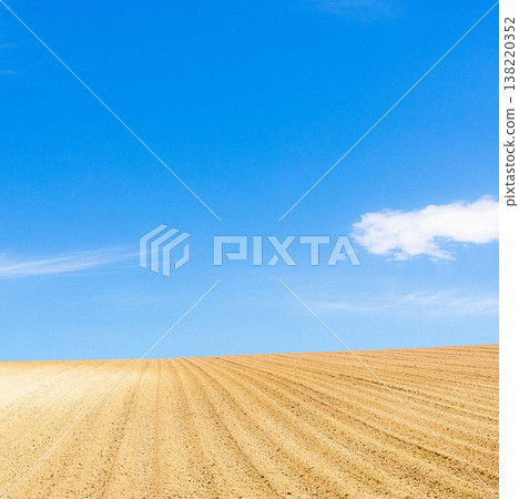 A refreshing spring scene of tilled fields in Biei, Hokkaido. A refreshing spring scene of tilled fields in Biei, Hokkaido. 138220352