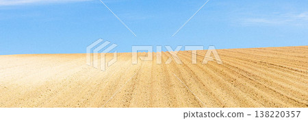 A refreshing spring scene of tilled fields in Biei, Hokkaido. A refreshing spring scene of tilled fields in Biei, Hokkaido. 138220357