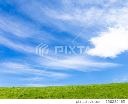 A simple landscape of refreshing early summer blue skies and the grasslands of Biei, Hokkaido. A simple landscape of refreshing early summer blue skies and the grasslands of Biei, Hokkaido. 138220465