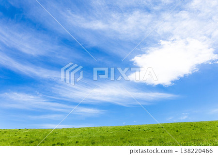 A simple landscape of refreshing early summer blue skies and the grasslands of Biei, Hokkaido. A simple landscape of refreshing early summer blue skies and the grasslands of Biei, Hokkaido. 138220466
