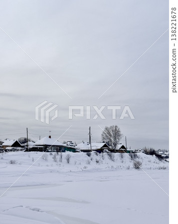winter landscape of the village, winter sunny day, no one on the street winter landscape of the village, winter sunny day, no one on the street 138221678