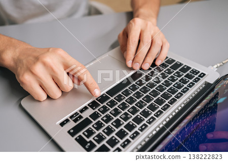 Businessman hands typing on laptop keyboard, freelancer male working or studying on personal computer, top side view showing modern technology and digital communication. Businessman hands typing on laptop keyboard, freelancer male working or studying on personal computer, top side view showing modern technology and digital communication. 138222823