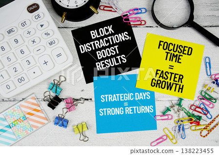 Block Distractions Boost Results, Focused Time Faster Growth, Strategic Days Strong Returns text written on paper note with calculator and magnifying glass on wooden background Block Distractions Boost Results, Focused Time Faster Growth, Strategic Days Strong Returns text written on paper note with calculator and magnifying glass on wooden background 138223455