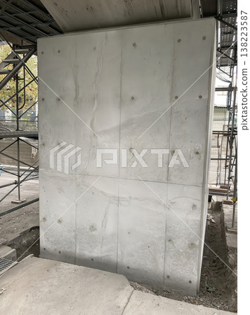 Cracks appearing in bridge piers after concrete reinforcement, initial defects in seismic reinforcement work, infrastructure inspection Cracks appearing in bridge piers after concrete reinforcement, initial defects in seismic reinforcement work, infrastructure inspection 138223587