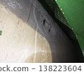 On-site investigation of aging infrastructure: Concrete spalling and corrosion, photographs taken for repair planning. 138223604