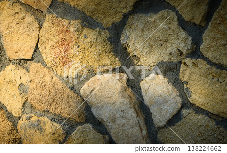 Stone Wall Background with Rays of Sunlight Stone Wall Background with Rays of Sunlight 138224662
