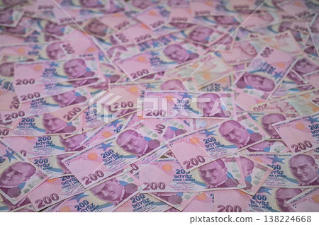 Piles of colorful banknotes spread across vibrant display of currency in Turkey Piles of colorful banknotes spread across vibrant display of currency in Turkey 138224668