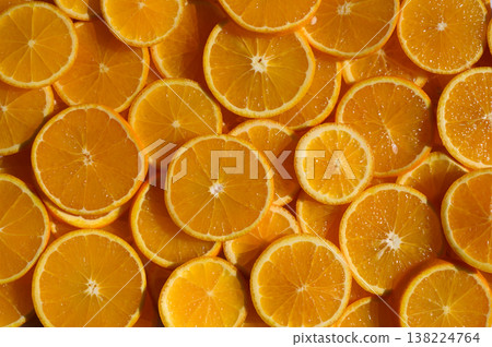 Freshly sliced oranges arranged beautifully for a vibrant summer feast Freshly sliced oranges arranged beautifully for a vibrant summer feast 138224764