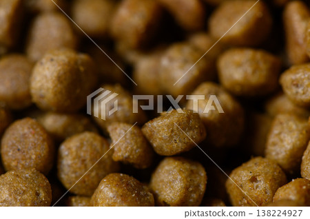 Textures of pet food showcase rich flavors in cozy home setting during evening hours 138224927