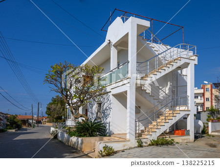 Modern architectural beauty on a sunny street in a coastal town by the sea 138225215