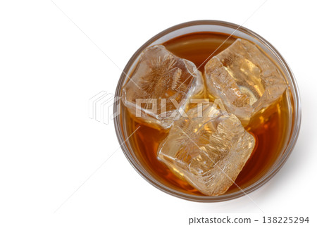 Glass of Whiskey with Ice Isolated on White Background Glass of Whiskey with Ice Isolated on White Background 138225294