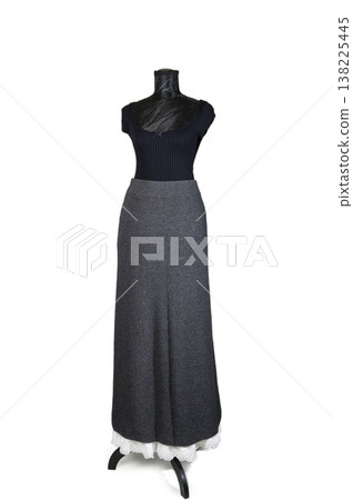 Clothing Set: Wool Skirt and a Beautiful Belt on a Dress Form on White Background. Fashion Look. Clothing Set: Wool Skirt and a Beautiful Belt on a Dress Form on White Background. Fashion Look. 138225445