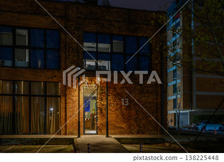 Door or Window of a Cafe Shop in a Cozy Alley, Decorated with Fairy Lights and Warm Glow. 138225448