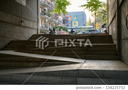 Arched Passageway with Stairs Through Historic Building Arched Passageway with Stairs Through Historic Building 138225732