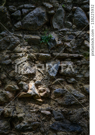 Old Stone Wall with Light Spots in St. Hilarion Castle, Northern Cyprus Old Stone Wall with Light Spots in St. Hilarion Castle, Northern Cyprus 138225932