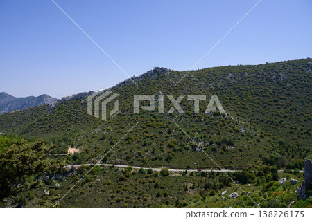 Majestic view from Saint Hilarion Castle showing Kyrenia and the Mediterranean under a clear blue sky. Northern Cyprus Majestic view from Saint Hilarion Castle showing Kyrenia and the Mediterranean under a clear blue sky. Northern Cyprus 138226175
