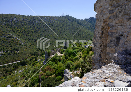 Breathtaking view from Saint Hilarion Castle mountain, showing Kyrenia and the blue Mediterranean Sea. A popular scenic spot in Northern Cyprus. Breathtaking view from Saint Hilarion Castle mountain, showing Kyrenia and the blue Mediterranean Sea. A popular scenic spot in Northern Cyprus. 138226186