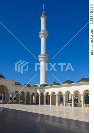 The inner courtyard of Selimiye Mosque in Nicosia, Northern Cyprus, blends Gothic and Islamic features, offering a peaceful spiritual space. 138226189