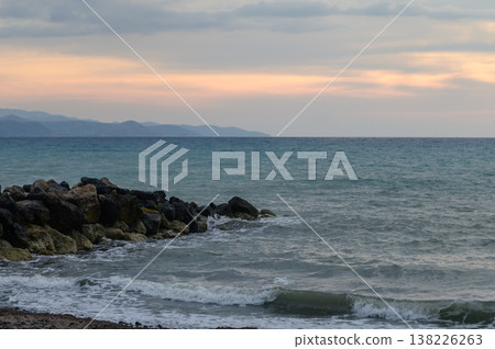 Golden hour over sea and mountains on Cyprus coast 138226263