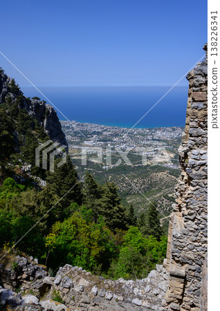 View of mountains and coastline through a stone-framed window in St. Hilarion Castle, Northern Cyprus. View of mountains and coastline through a stone-framed window in St. Hilarion Castle, Northern Cyprus. 138226341