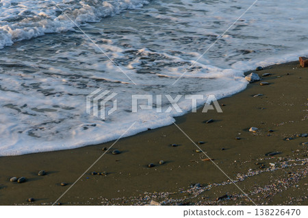 Golden sunset over sandy beach with sea rocks in Cyprus Golden sunset over sandy beach with sea rocks in Cyprus 138226470