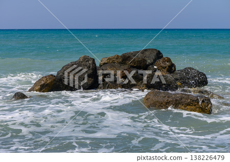 Breathtaking view of the Mediterranean Sea with crystal-clear water and a cloudless, bright blue sky in Cyprus. Breathtaking view of the Mediterranean Sea with crystal-clear water and a cloudless, bright blue sky in Cyprus. 138226479