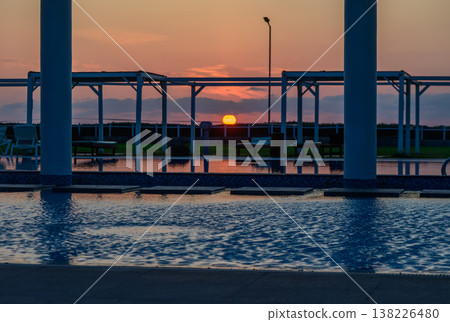 Sunset reflections in the sea and swimming pool on Cyprus coast Sunset reflections in the sea and swimming pool on Cyprus coast Sunset reflections in the sea and swimming pool on Cyprus coast Sunset reflections in the sea and swimming pool on Cyprus coast 138226480