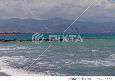Serene Mediterranean Sea with gentle waves and a spotless blue sky on the coast of Cyprus, perfect for relaxation. Serene Mediterranean Sea with gentle waves and a spotless blue sky on the coast of Cyprus, perfect for relaxation. 138226567