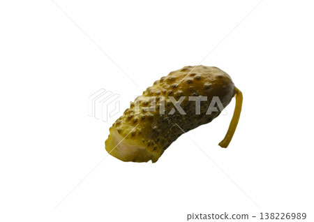 Salted cucumber with bite marks on white background 138226989