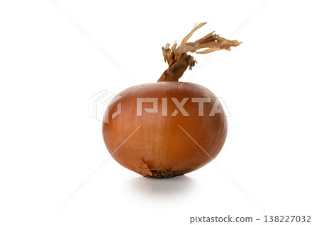 Whole brown onion isolated on white background Whole brown onion isolated on white background 138227032