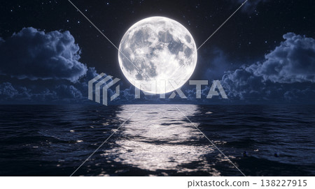 Full moon illuminating the rippling ocean surface under a clear night sky, soft clouds and shimmering reflections 138227915