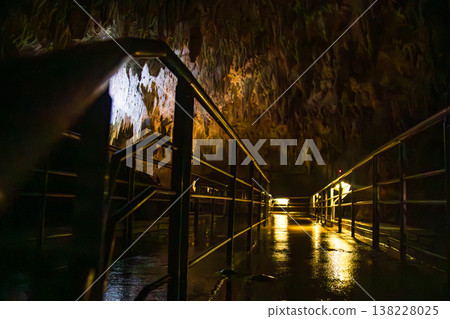The eerie light and damp reflections of the underground passage The eerie light and damp reflections of the underground passage 138228025