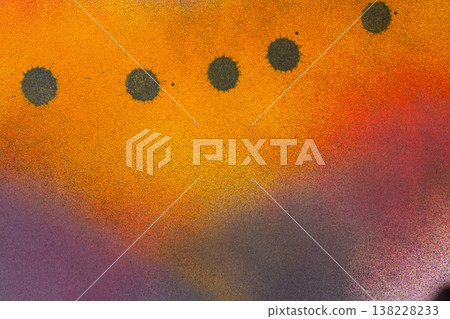 Ink splattered on a yellow background Ink splattered on a yellow background 138228233