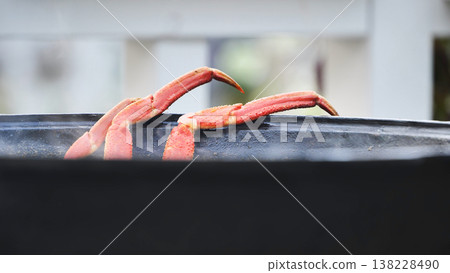 Crab legs boiling on seafood pot for dinner Crab legs boiling on seafood pot for dinner 138228490