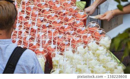 Watermelon fruit in plastic cups at Moscow market Watermelon fruit in plastic cups at Moscow market 138228608
