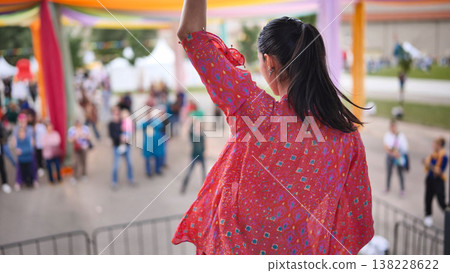 Woman performing Indian dance at cultural festival in Moscow with crowd Woman performing Indian dance at cultural festival in Moscow with crowd 138228622
