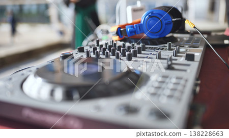 Dj controller and blue headphones for music at Ganesh Chaturthi festival Dj controller and blue headphones for music at Ganesh Chaturthi festival 138228663